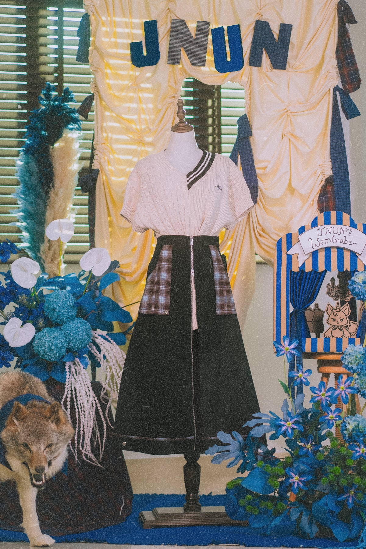 JNUN CHECK POCKET MIDI SKIRT