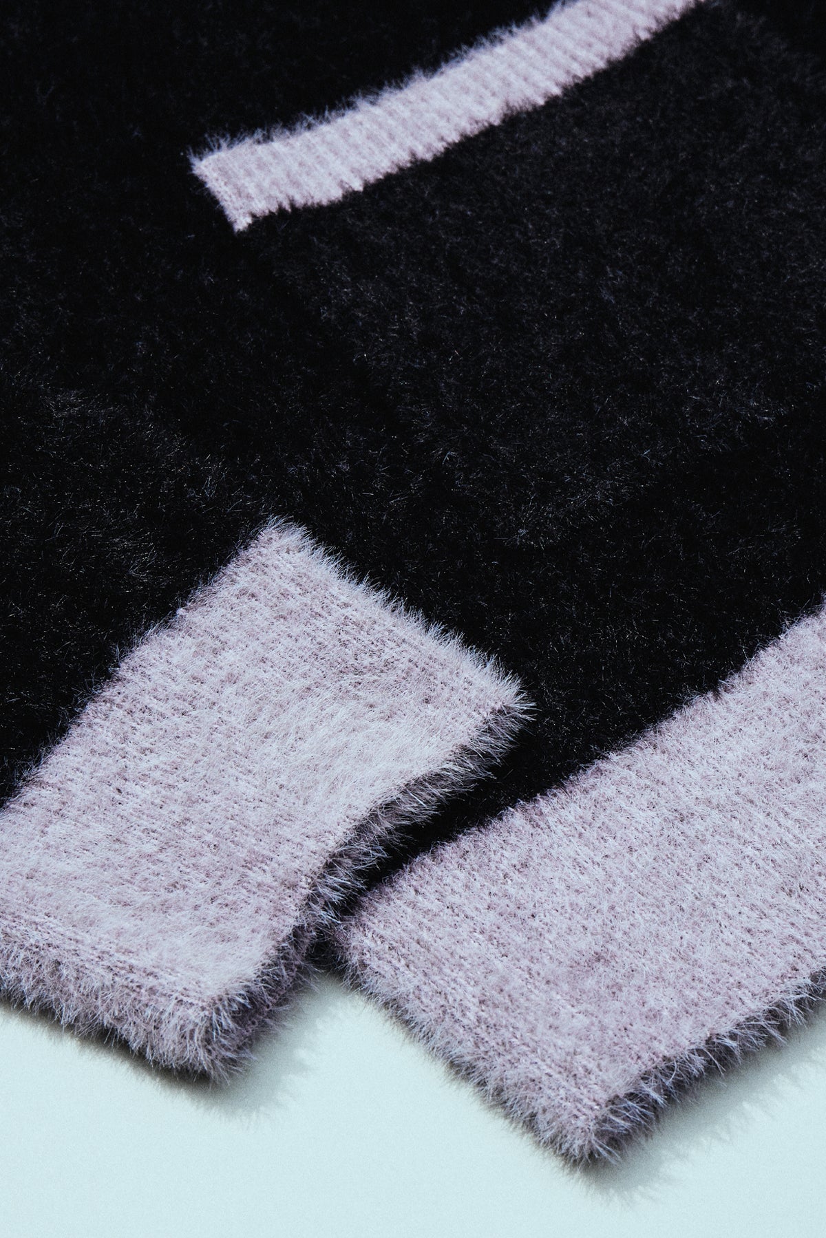 UNISON ZIPPED CARDIGAN